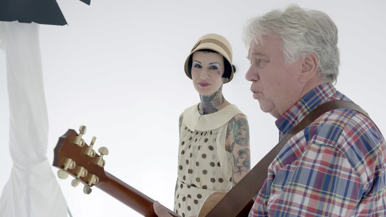 Kids using an augmented reality app to interact with a children’s songbook.